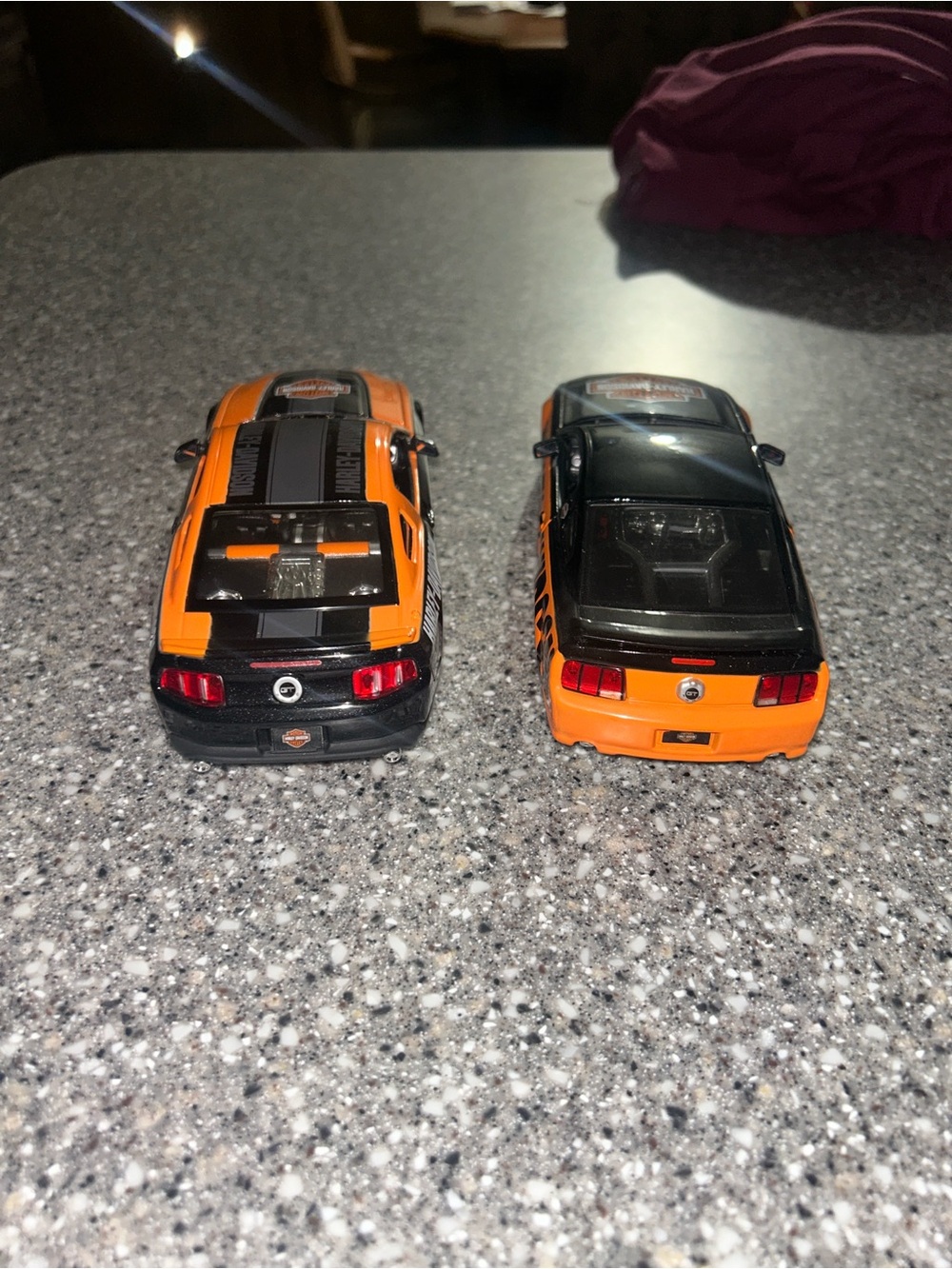 Harley-Davidson Orange and Black Car Duo